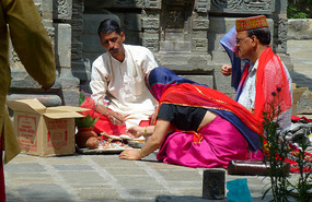 Worshippers Giving Offerings at Basesara Temple