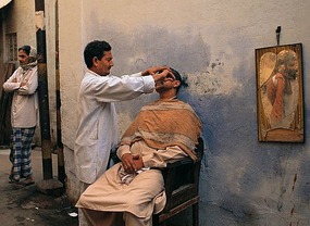 Street Barber in Muslim Quarters, Delhi*