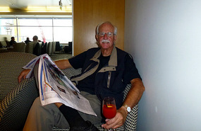 A Relaxed Alan in the Airport Lounge