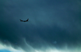 Flight out of Sydney Against a Stormy Sky