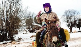 Woman Rides Her Donkey into Timahdite, 2012 Freeze