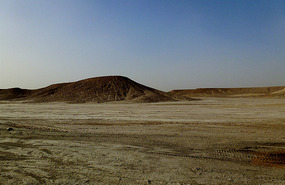 Contrasting White Gravel and Chocolate Mountains