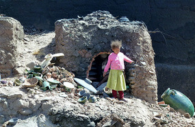 A Child Plays Outside the Tamegroute Pottery
