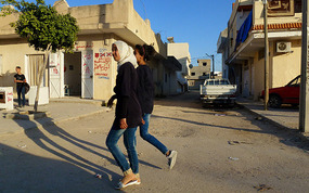 Young Women Wearing Head Scarves and Jeans