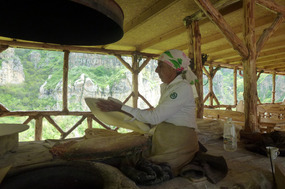 Woman Making Fresh Lavash Near Geghard Monastery