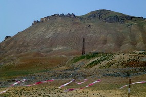 An Oil Rig & Rocky Outcrops Toward Baku