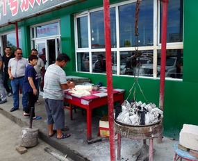 Cook Making Bread, Mutton Soup Restaurant 