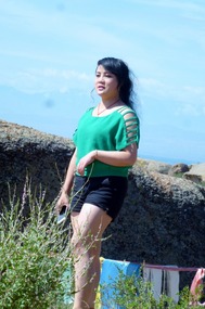 Young Woman Tourist in Mysterious Stones Park