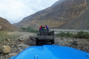 We Follow a Tractor and Trailer Out of Shimshal