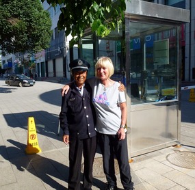 Our Policeman Friend with me at the Sunshine Hotel