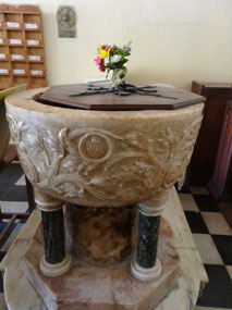 Baptismal covers hole where children were thrown