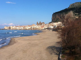 Cefalu, the Duomo in center and La Rocca on right
