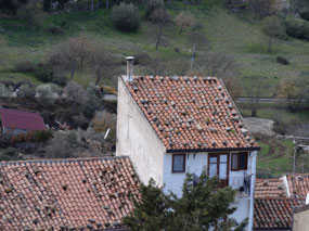 A lot of houses cover their roofs with rocks