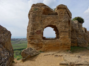 Tomb created in wall around site