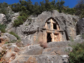 One of several rock tombs just above town