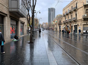 Walking down Jaffa Street on a wet day