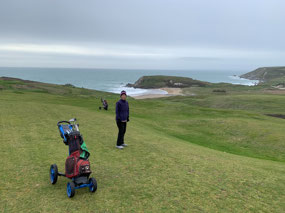 Scenic tee boxes, church and beach behind