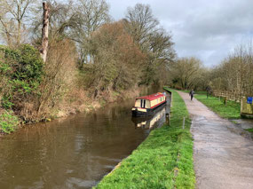 Canal boat approaching the Brynich Locks