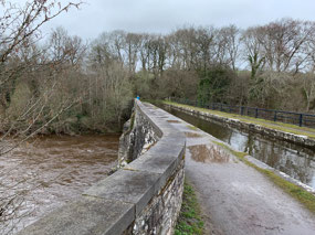 Canal crosses river