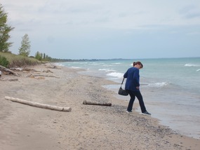 Arlene testing the wet sand