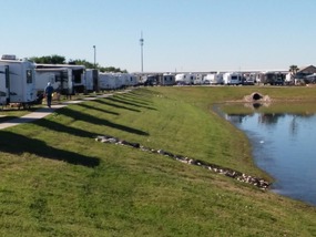 A lot of the RVs are backed up against the lake.