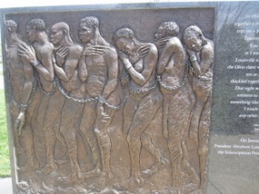 Plaque depicting shackled slaves