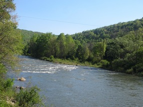 It is nice to see a "natural river" ~ no cement!
