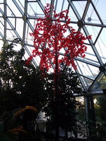 1,000 glass butterflies on a 12 foot steel tree