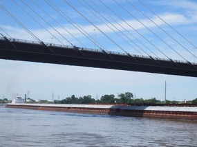 15 grain barges & tug