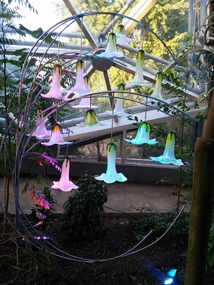 8 foot display with 16 glass flowers
