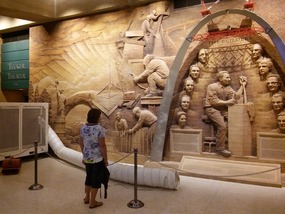 Relief mural of the building of the Arch