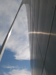 Standing next to the arch!  It's taller than me!