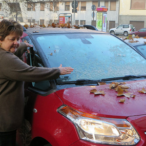 De-icing the car in Asti