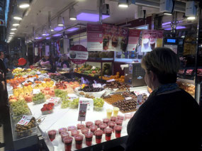 Julie trying her luck to buy some fruit