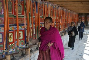 Monk and Prayer Wheels