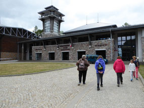 Maria leading, approaching ticket office