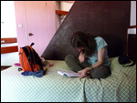 Sian studying her guide -  - Yeha Hotel-Axum