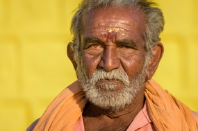 Holy man tending a hillside temple