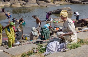 Morning rituals by the river