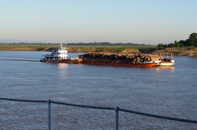 Teak barge on time