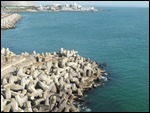 Cement rocks to stop the sea