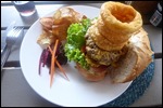 John's lunch they are onion rings on top of burger