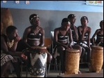 And accompany the singers on the drums