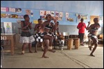 The girls dance and sing for us
