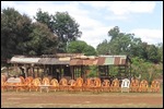 Cane chairs for sale on side of road