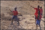 Children walking to school all wave