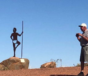 Corten steel warrior overlooking his land