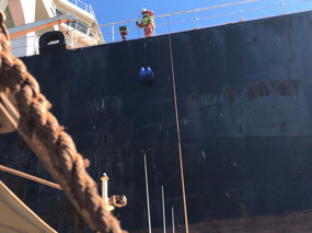 Hauling up shopping on a rope