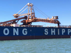 Loading iron ore for China