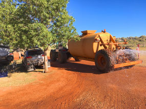 Roads watered every day at 80 Mile